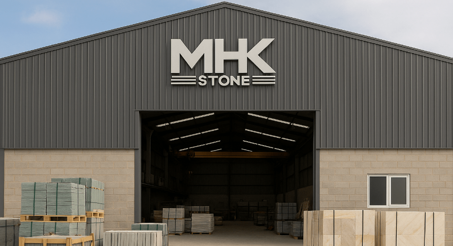 MHK Stone warehouse exterior with pallets of green and cream natural stone tiles – prepared for international export