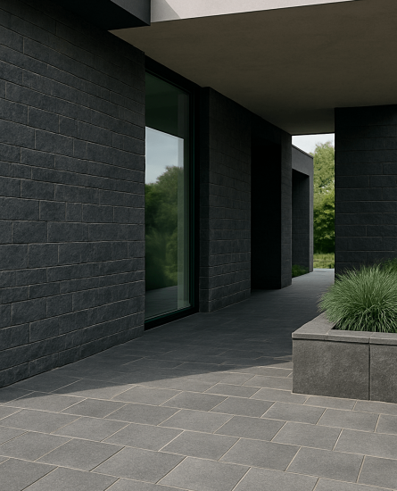Modern Architecture with Andesite Stone – Durable & Sleek Finish Modern building facade and walkway using dark gray andesite stone tiles